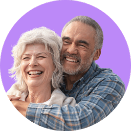 Smiling senior couple embracing